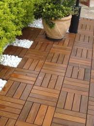 Composite deck tiles from newtechwood are the answer. Eco Teak Eco Teak Wooden Decking Tiles It S Made Out Facebook