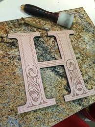 Before doing any kind of carving, the leather needs to be cased. Hand Tooled Leather Letters Handmade Leather Work Hand Tooled Leather Leather Tooling