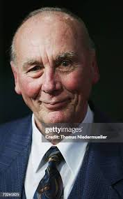 Dr. Theo Zwanziger congratulates Horst Eckel, the former German... News  Photo