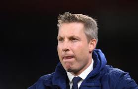 Cardiff sack manager Neil Harris after six-match losing run as Bluebirds  star Lee Tomlin claims players have not been told