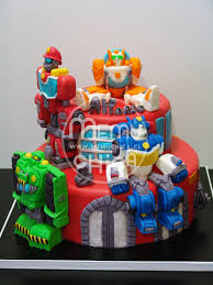Rescue Bots Rescue Bots Cake Rescue Bots Birthday Rescue Bots Birthday Party Check out our rescue bots cake selection for the very best in unique or custom, handmade pieces from our party décor shops. pinterest
