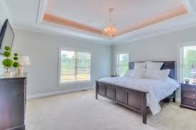 Arched ceilings to emphasize details. Recessed Ceiling With Lighting Orb Chandalier French Country Bedroom Cleveland By Otero Signature Homes Houzz
