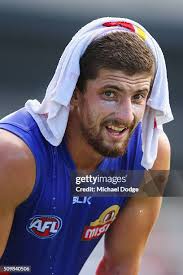 Jake Stringer of the Bulldogs gathers the ball during the Western... News  Photo