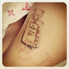 Mind Blowing Nos Chanel Bottle Tattoo With Chain Tattooshunter Com Bottle Tattoo Perfume Bottle Tattoo Chanel Tattoo