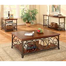 If you're going for a trendy, industrial style. Scrolled Metal And Wood Coffee Table Overstock Com Shopping The Best Deals On Coffee Sofa End Tables Wood End Tables End Tables Coffee Table Metal Frame