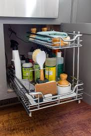 to organize under the kitchen sink