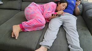 Stepsister sucks stepbrother and eats his sperm while he plays video games