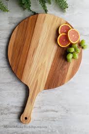 Round Pizza Serving Board With Handle Pizza Paddle Cheese Board Pizza Peel By Myoldwhiskeywork Pizza Serving Boards Cheese Serving Board Wooden Cheese Board