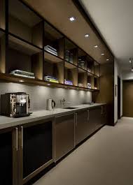 Puck Lights Under These Bookshelves Create Pools Of Light And Dark For Drama And Task Kitchen Sink Lighting Led Under Cabinet Lighting Kitchen Lighting Layout