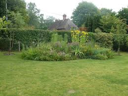 This sample raised bed layout design allows you to maximize even the smallest spaces. Island Bed Garden Design How To Make An Island Flower Bed Gardening Know How