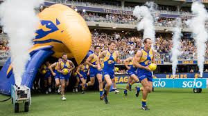 Eagles fans get first look at nic naitanui, tim kelly vs bombers. West Coast Ditch Tradition Of Players Running Through Team Banner