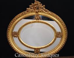 It stands as opposed to leaning. Victorian Oval Mantle Mirror Gilt Frame