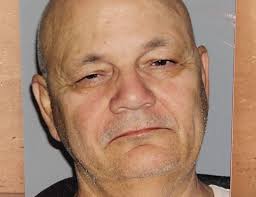 Reputed mob boss cleared of killing officer