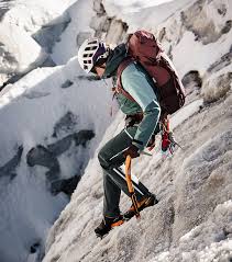 glacier with crampons and an ice axe ...