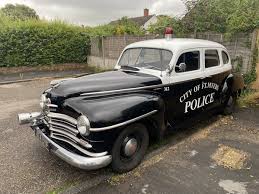 Image result for Cruiser Maroon 1947 Plymouth