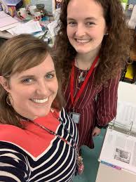 Priscilla contemplating "The Cat in the Hat" book