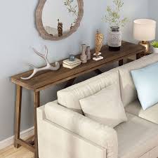 This Wooden Console Table Showcases A Sawhorse Leg Design And Medium Brown Finish 59 Extra Long Desktop Off In 2020 Long Sofa Table Rustic Console Tables Sofa Table