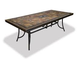 The square table features a gray tile top with a floral design and hole for umbrella to the center. Tile Patio Dining Table Home Designing