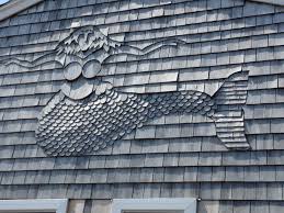 Using red, and yellow certi #1 cedar shingles, and incorporating stains when appropriate, your design options are virtually unlimited. Random Shingle Art On The Cape Pocasset Marina Shingle Style Exterior Siding Shingle Style Architecture