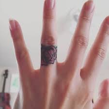 Yellow rose tattoo is a symbolism of friendship. 30 Awesome Dainty Small Tattoos Designs With Meanings Body Art Guru