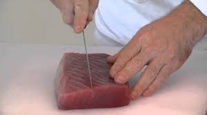 How to make tuna poke bowls. How To Cut An Ahi Tuna Steak For An Appetizer Youtube