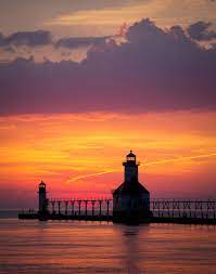 St Joe Sunset Sunset Over Lake Michigan At St Joseph Michigan S Famous Lighthouse Smokey Mountains Vacation Michigan Beach Towns Michigan Beaches
