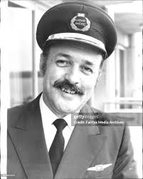 Senior Captain Len Cooper, operation managers for Cathay Pacific... News  Photo