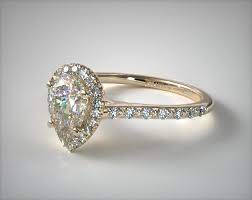 Bar set diamond solitaire engagement ring in rose gold. 1 31 Carat G Si2 Pear Shaped Diamond Pave Halo And Shank Diamond Engagement Ring