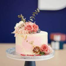Pastel pink floral cake with oregano. Pastel Pink Swirl Cake With Dusty Rose Floral And Dried Petals