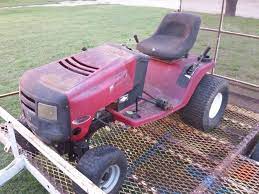 Here is my daughter mowing her lawn with a triple recycled lawn mower. Murray Turned 4x4 Utv