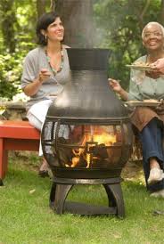 Add an outdoor fire pit that stands out from the rest with this black steel chiminea. Cast Iron Chiminea Lowes Decor Ideas