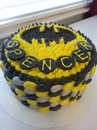 Butter Icing Birthday Cake For Little Boy Batman Cake Chocolate Cake Tinted Black With A Lemon Yellow Buttercream Fondant Circles And Royal Icing Name Boy Birthday Cake Grooms Cake Buttercream Cake