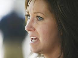 Wife defends West Valley City detective at downtown rally