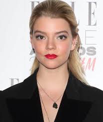 Anya Taylor-Joy Wears Burberry Boots With Circular Cutout Heels