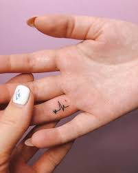 Understated Hand Tattoos That You Won T Regret Tiny Tattoos For Girls Cute Little Tattoos Small Hand Tattoos