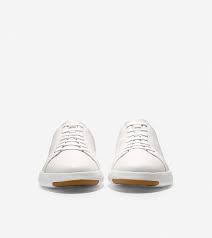 Its rich leathers and good looks belie its flexibility, cushioning, and incredible lightweight comfort. Men S Grandpro Tennis Sneaker In White Cole Haan