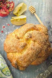 Depending on how high versus how wide your braid is, you may need to bake it for an additional 5 to 10 minutes. Apples And Honey Challah For Rosh Hashanah