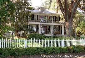 A charming wraparound porch greets you at the entrance of this traditional country house plan. Two Story Porches Build A Porch Way Up High Between Naps On The Porch
