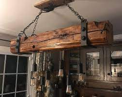 Wood fluorescent light fixtures jeeworld. Pulley Light Beam Industrial Vintage Barn Beam Lighting Wood Beams Wood Light Fixture