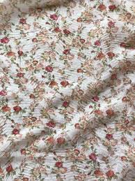 Skip to the end of the images gallery. Floral Print Crinkled Chiffon Fabric Polyester 120cm Wide Powder Pink Bodikian Textiles