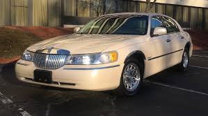 Image result for Performance White 1998 Town Car