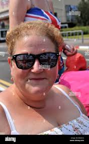 Woman wearing union jack hi-res stock photography and images