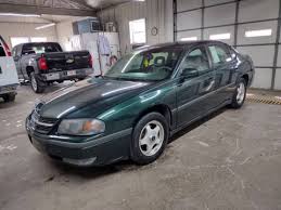 Image result for Medium Green 2002 Impala