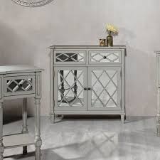 Drops modern sideboard with mirrored doors and inserts in solid wood canaletto walnut, dark next to scandinavian design sideboards, where white and wood are combined together in a complete. Clara Grey Mirrored Sideboard Zurleys