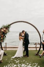 Destination Hawaii Wedding Bridal Dress Grace Loves Lace Tropical Floral Arch White Aisle Orchid Bloom Beach Wedding With Images Oceanfront Wedding Kauai Wedding