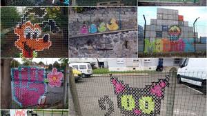 Some people seem to forget that you can actually paint on your fences! Creative Street Art Cross Stitch Murals On Fences