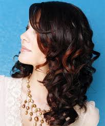 This hair weave looks perfect, cute and pretty on everyone. Long Curly Black Hairstyle With Red Highlights