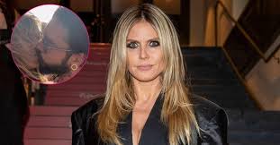 Heidi Klum cuddling with Tom Kaulitz