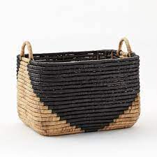 Seagrass baskets are available for a range of prices at an equal range of retailers. Woven Seagrass Baskets Natural Black Seagrass Basket Black Basket Basket And Crate