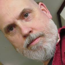 Who is the person in the photo taken at Catamount Stadium?